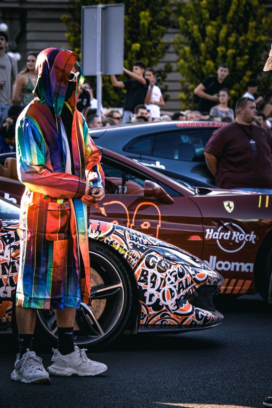 A Person in a Rainbow Coat Stands jigsaw puzzle