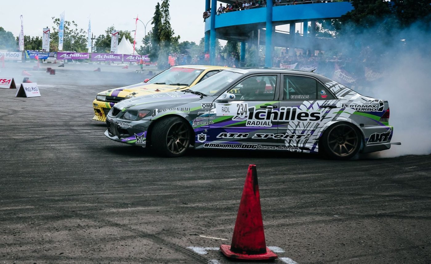 A Thrilling Scene of Cars Drifting on jigsaw puzzle