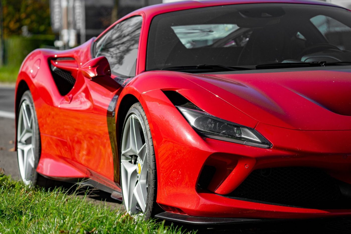 A Vibrant Red Sports Car Parked on jigsaw puzzle