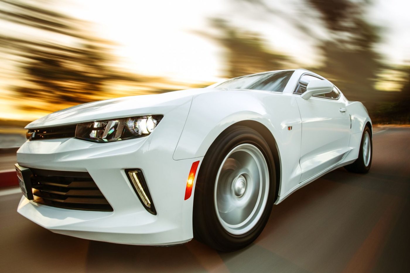 A White Sportscar in Motion Showcasing Speed — Free Online Jigsaw Puzzle | Jigsaw Planet