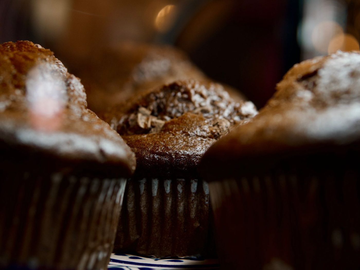 Delicious Chocolate Muffins Captured in Cozy Ambient jigsaw puzzle