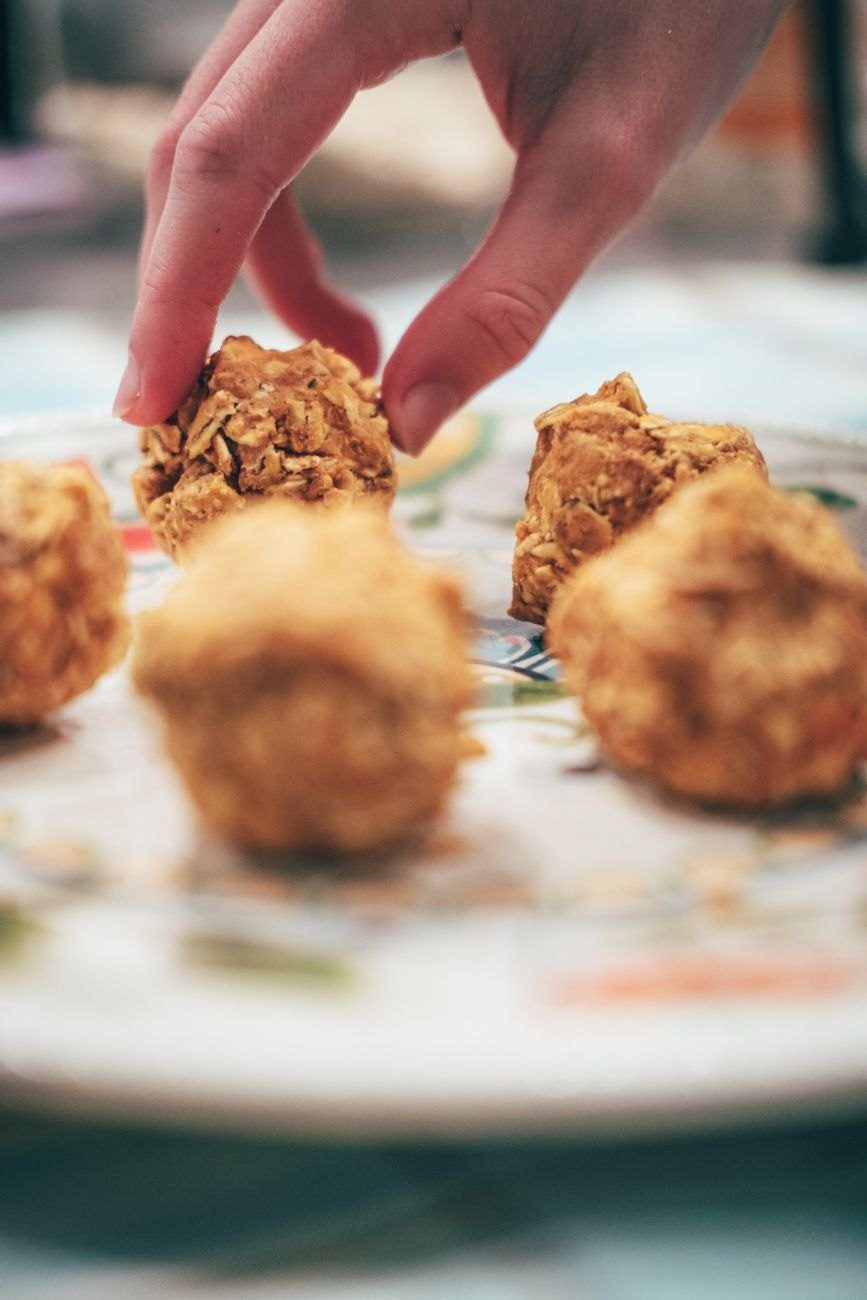 Hand Arranging Homemade Baked Snacks on a — Free Online Jigsaw Puzzle | Jigsaw Planet