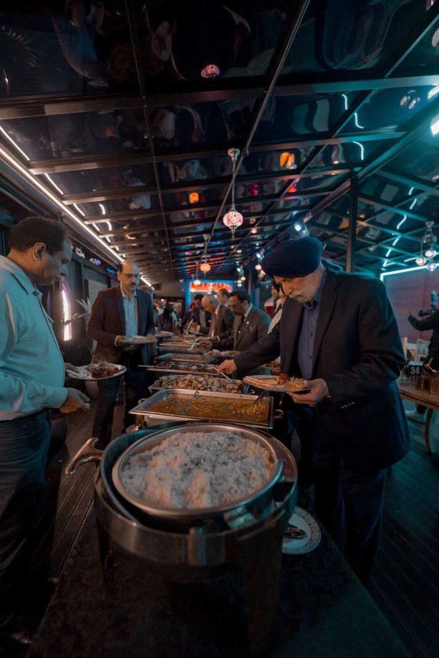 Men Enjoying a Grand Buffet Spread at — Free Online Jigsaw Puzzle | Jigsaw Planet
